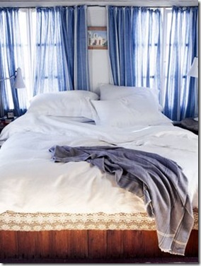 dreamhouse blog bed with blue curtains