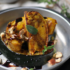 Roasted Acorn Squash with Hazelnuts and Balsamic Reduction