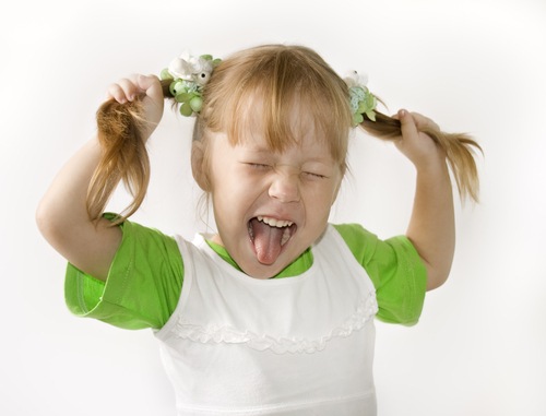 [shutterstock_27143851 Girl pull ponytails[5].jpg]