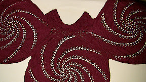 wider view of the medallion capelet