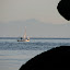 Gypsy gets a head start on crossing Rosario Strait, as seen from Matia Island