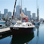 Nice shot of Whisper in Bell Harbor Marina with Seattle skyline