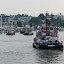 Several tugs returning to the harbor