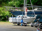 S.K. and Glen working on their boat