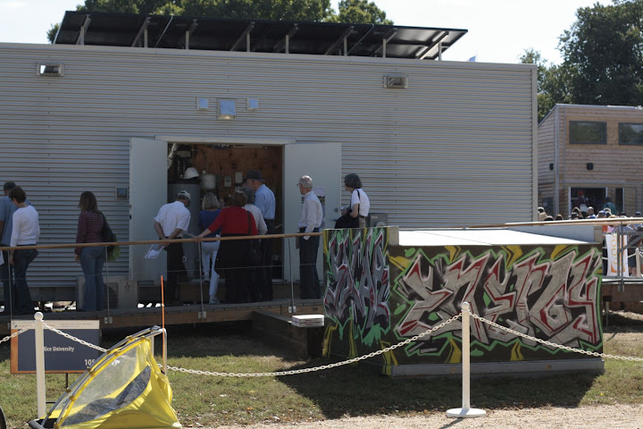 Looking at the back of the ZEROW HOUSE and our awesome Solar Energy Power outbuilding.