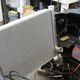 I put the radiator in to test fit, and found that the battery is in the way. So I got the parts to move the battery to the trunk.