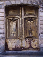 Date: December 2007</p>
<p>Location: Paris</p>
<p>Story: You get two pictures today, the first is the door, the second the inscription above the door. The hotel is long gone. There is a plaque in the wall beside this door that refers you to http://cribier.net/Hotel-Raoul/ for more information on the door. The article is in French.</p>
<p>It is not clear why the door has been almost preserved. It seems to have survived in spite of the neglect imposed upon it. A magnificent door it is. The buildings it hides date from the 1500's to the 1800's. I am also not sure why it is called an hotel, since it appears to have never fulfilled that role.