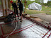 Kaily, Kate and Brad lay out the piping, using the width of a tamper as their guide while stapling every 3 feet or so.
MVG