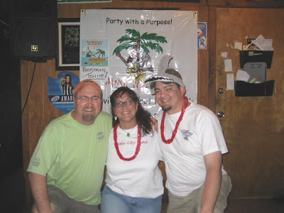 Don, Kat and Brian doing the 'pose and smile for a pic y'all' thing in front of the club banner.