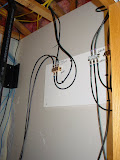 My Make Shift A/V distribution block. On the right is the cable tv splitter and on the right is the TV antenna splitter that runs to all of my ATSC tuners in my HTPC.
