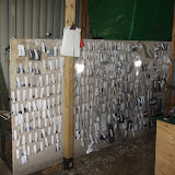 Small parts stapled to a wall