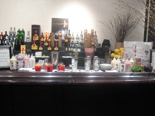 The Astor Center has been turned into the official bar of the Manhattan Cocktail Classic. As long as you're taking a class there, you're welcome to peruse the main area and grab a cocktail.