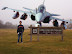 Warning sign - A plane is trying to ram into this sign. So you better step aside.