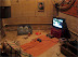 Home of the hardcore gamer - That yellow toy car on TV helps him trough the worst times.