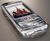 1.3 million dollars cellphone - This phone features a diamond-encrusted case and a 5-carat blue diamond center navigation button.