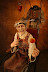 Want some candy, little boy? - Looks like a wax statue at a museum of horror or something...