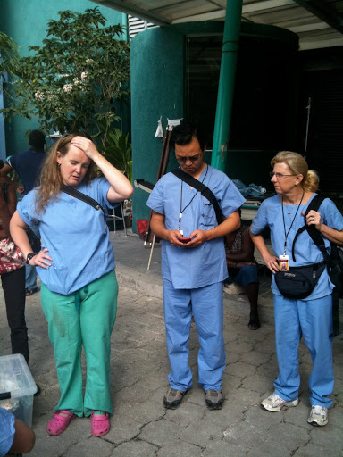 Trauma surgeon, Kate, our team leader, Enoch, and our occupational therapist, Cheryl