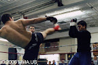 Andrew attempting a high kick, and me attempting to block...