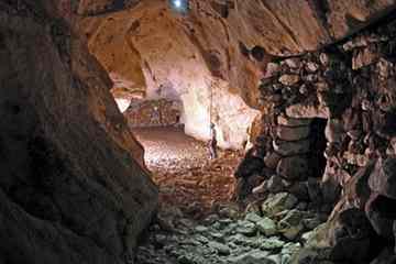 Mexican archaeologists announced in August of 2008 the discovery of a maze of stone temples in underground caves, some submerged in water and containing human bones. Ancient Mayas likely considered the construction a portal for dead souls to pass into the underworld, scholars say.  Mexican archaeologists announced in August of 2008 the discovery of a maze of stone temples in underground caves, some submerged in water and containing human bones. Ancient Mayas likely considered the construction a portal for dead souls to pass into the underworld, scholars say.