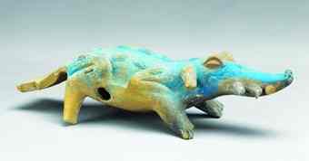 This small effigy of a crocodile, painted in the pigment known as Maya blue, could be a whistle or rattle.
