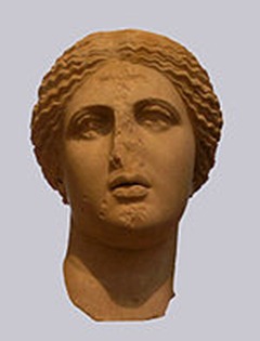 The Aspremont-Leyde/Arles Aphrodite (Phryne is thought to have been the model). The Christian cross and damage in nose and eyes are ancient vandalism to discredit pagan gods. The Aspremont-Leyde/Arles Aphrodite (Phryne is thought to have been the model). The Christian cross and damage in nose and eyes are ancient vandalism to discredit pagan gods.