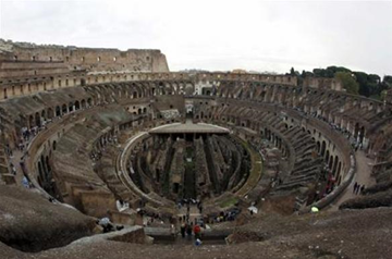 People visit the third tier of Rome's ancient Colosseum October 14, 2010.