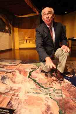 Archaeologist Mark Lehner points on Friday to a few of the important archaeological areas in Egypt on a large map.