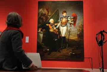 A woman observes the painting 'General Lariboisiere says goodbye to his son before the battle of Borodino' at the exhibition 'Napoleon and Europe. Dream and Trauma' at the Bundeskunsthalle in Bonn, Germany. The exhibition pictures the Napoleonic era with about 400 exhibits runs until 25 April 2011. EPA/JOERG. CARASTENSEN.