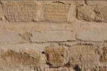 Erosion threatens inscriptions engraved on building blocks of the Susa Castle. Erosion threatens inscriptions engraved on building blocks of the Susa Castle.