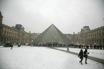 The Louvre Museum is seen as heavy snow hits Paris on Dec. 19, 2010 in Paris, France.