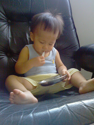 Ethan Eating Thin Strips of Chinese Pear