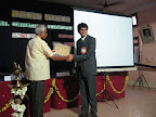 Dr Suprasada Rao, Presenting a Memento to Dr Ganesh, Renowned Endocrinoloigst of the city.