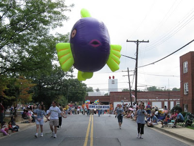 The fish balloon, flying down the street.