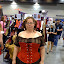 Hung over, trying on a corset at the Vancouver Anime Evolution con.