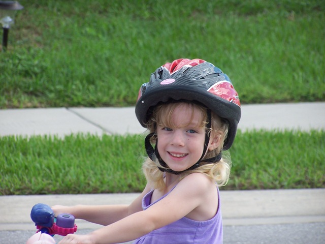 [So happy to have her bike[2].jpg]