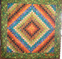 “The Fire Within” Colour Wash Trip Around the World Quilt. Skill Level : All