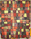 “Zen Courtyard” This is a stained glass style stack and slash quilt as you go quilt. It is reversable.  Intermediate +