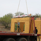 1st crane beam being lowered - library