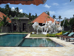 Swimming pool at hotel Puri Rai