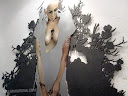Catherine Brooks: Perunica's Reign (2009). Wood cut by Mel, painted by Catherine. Oil & acrylic on handcut wood assemblage 96 x 72, 244 x 183 cm