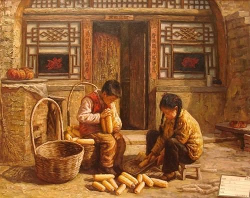 兄妹在搓玉米