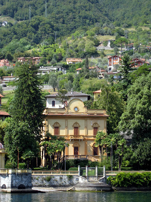 The shores of Lake Como in Italy as seen from a ferry