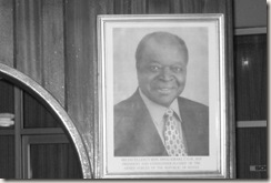 Photo of Mwai Kibaki hangs above desk at Hotel Sirikwa, Eldoret