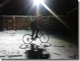 Adam, mountain biking in the snow around the car park
