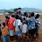 Dustan surrounded by curious kids
