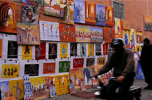 Paintings on the street in Essaouira, photo by Leanne Lee