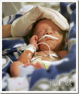 Jenny Heminger, RN (cq) checks Brooks Layton Murray (cq) in the NICU at St. Vincent Women's Hospital, Friday, February 9, 2007.  Brooks was the second in a set of quadruplets born to Jen and Brad Murray last Friday, February 2, 2007.  He was 3lbs at birth.    The four brothers are all in the NICU.  (Kelly Wilkinson / The Indianapolis Star)