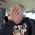 My Dad in the car wearing his new sweatshirt I got for him for Christmas.
