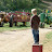2007 Little boy waiting patiently for the tractor to show up.