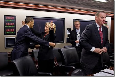 Obama Clinton hug